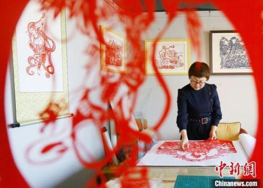 Gansu Intangible Cultural Heritage Inheritor: Telling Dunhuang Stories through Paper-Cutting